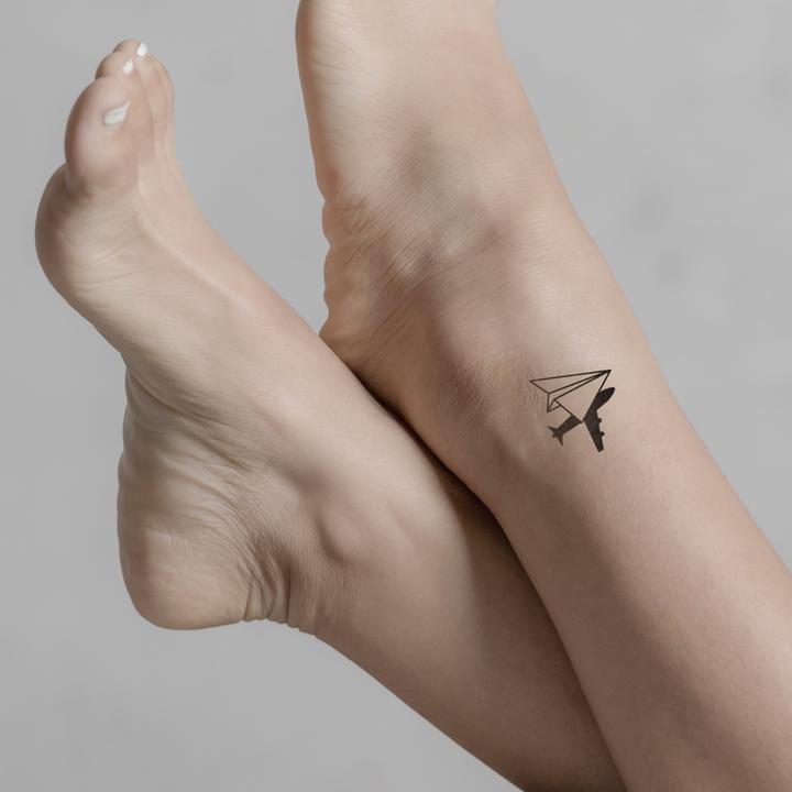 Immagine prodotto minink Tatuaggio temporaneo - aeroplano di carta con ombra di aeroplano