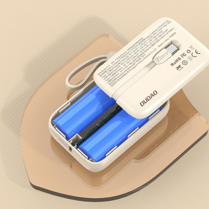 Actual product image Dudao K14 10000mAh power bank with USB-C / Lightning cables - beige (10000 mAh, 22.50 W, 37 Wh)