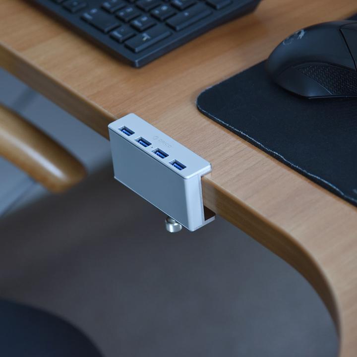 Actual product image Orico MH4PU-P-SV-BP (USB-C, 4 Ports)