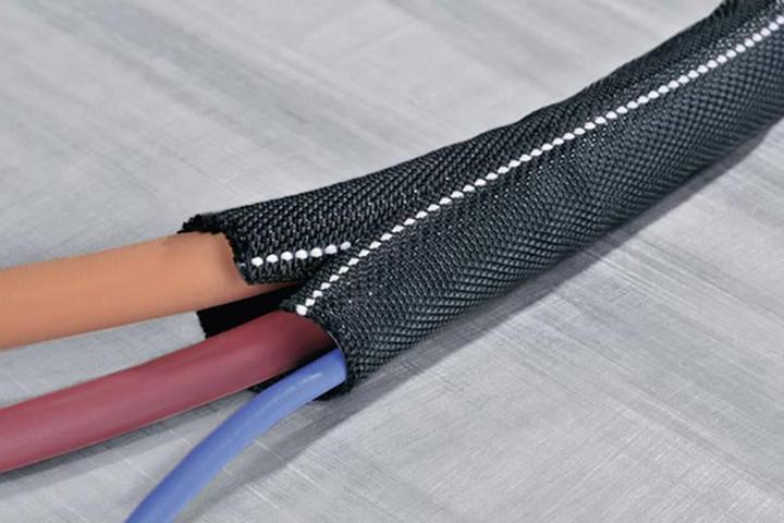 Actual product image HellermannTyton 170-01109 Twist-In-FR 50-PET-BK Braided Sleeving Black Polyester 38 to 50mm 15m (Cable conduit, 1500 cm)