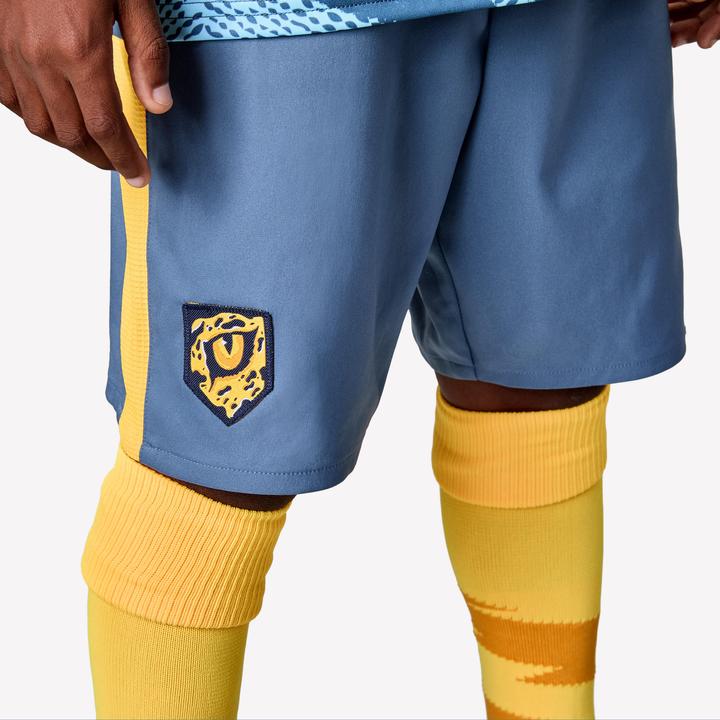 Produktbild Kipsta Kinder Fussball Shorts - VIRALTO Kids grau mit orangem Streifen