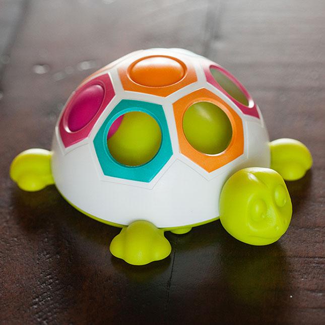 Produktbild Fat Brain Toys Pop N Slide Shelly (Englisch, 0.50 - 2 Jahre)