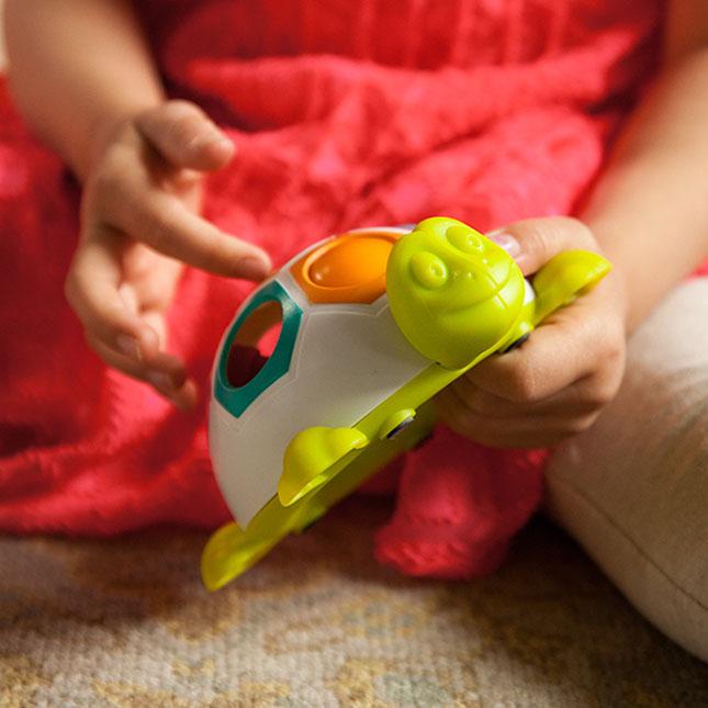 Produktbild Fat Brain Toys Pop N Slide Shelly (Englisch, 0.50 - 2 Jahre)