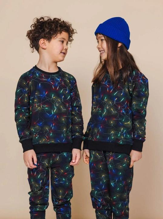 Produktbild Snurk Kinderpullover Weihnachtslichter (104)