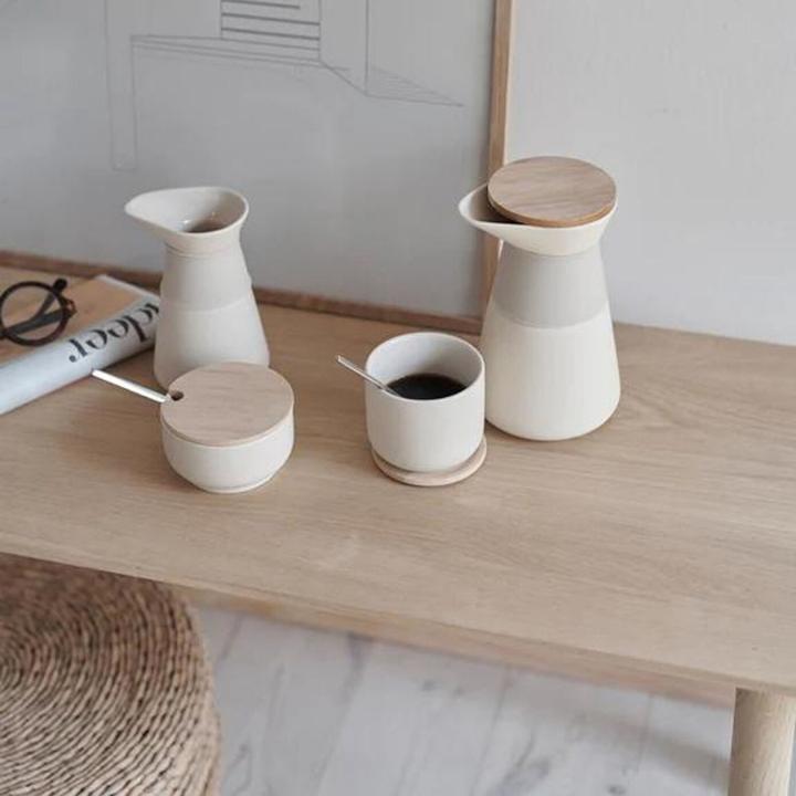 Produktbild Stelton Theo cup with coaster 0.2 l. sand (200 ml, 1x)