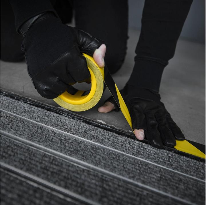 Produktbild Defender EXA-TAPE® VALUE BY 50 - PVC Warnband | schwarz/gelb | 50 mm x 33 m (50 mm)