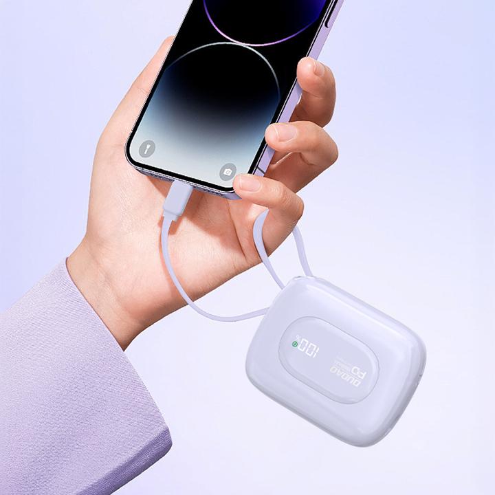 Produktbild Dudao K32 22,5 W 10000 mAh Powerbank mit integriertem USB-C/ Lightning Kabel - Lila (10000 mAh, 22.50 W, 38.50 Wh)