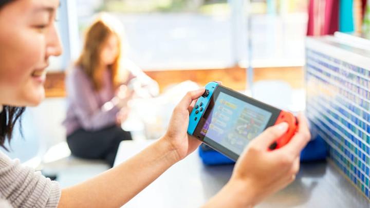 Actual product image Nintendo Switch Console - Neon Red/Neon Blue (UK) (Switch)