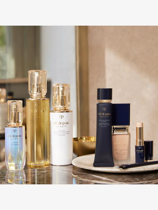 Produktbild Clé De Peau Pore Refining Mattifying Veil (Sonnencreme, SPF 25, 38 ml)