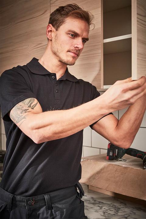 Produktbild Helly Hansen Workwear Marškinėliai HELLY HANSEN Manchester Polo, juodi 2XL (XXL)