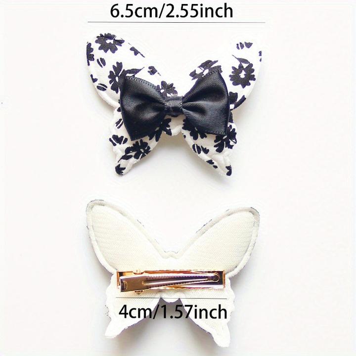 Actual product image Activity Board 4 Stück elegante Schleifen-Haarspangen - Polyester, geflochtene, florale und einfarbige Designs (4 pcs.)