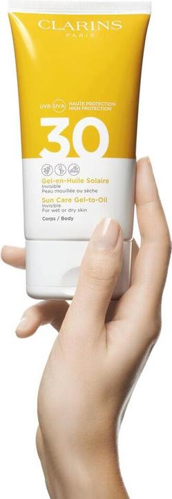 Produktbild Clarins Sun - Gel-en-Huile Solaire Corps SPF30 (Sonnencreme, SPF 30, 150 ml, 197 g)
