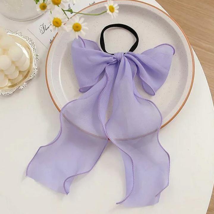 Immagine prodotto Avizar Transparenter Schleifen-Haargummi (Elastico per capelli)