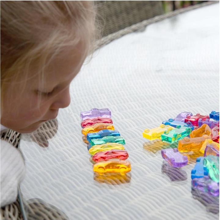 Actual product image TickiT Set with 72 colorful, translucent plastic car figures in a storage box