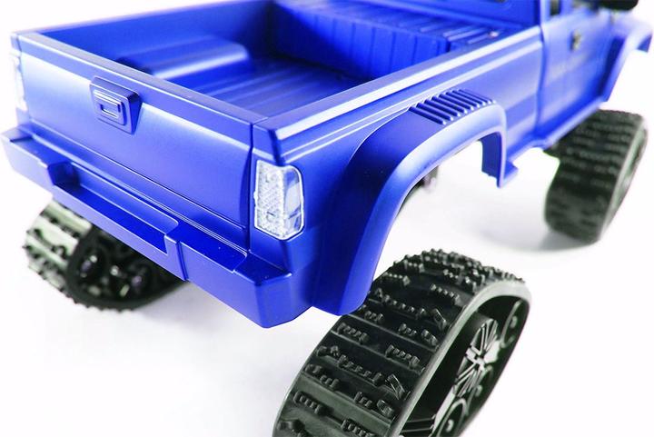 Image du produit Amewi Camionnette RC AMX RTR bleu avec roues et chaînes 4WD (RTR Prêt à fonctionner)