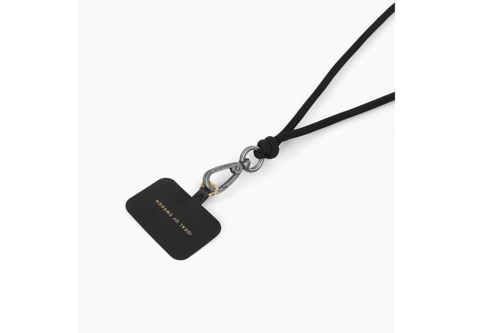 Actual product image iDeal Of Sweden for all cases with central charging connector Cord Phone Strap Coal Black