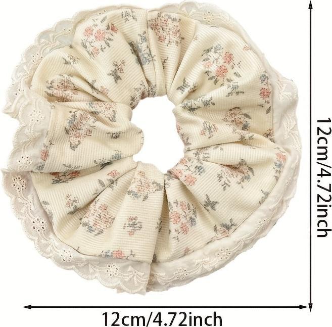 Produktbild Activity Board 1 Stk. Elegantes, florales Haargummi mit Spitzenbesatz - weicher Stoff, zartes Blumendesign (Haargummi)
