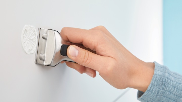 Actual product image tesa MOON hairdryer holder incl. adhesive solution without drilling