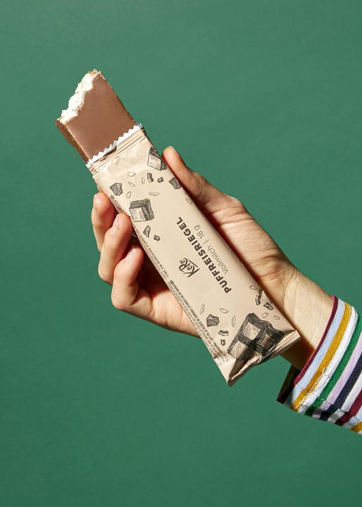 Produktbild KoRo Riegel aus braunem Vollkorneis überzogen mit Vollmilchschokolade (360 g)