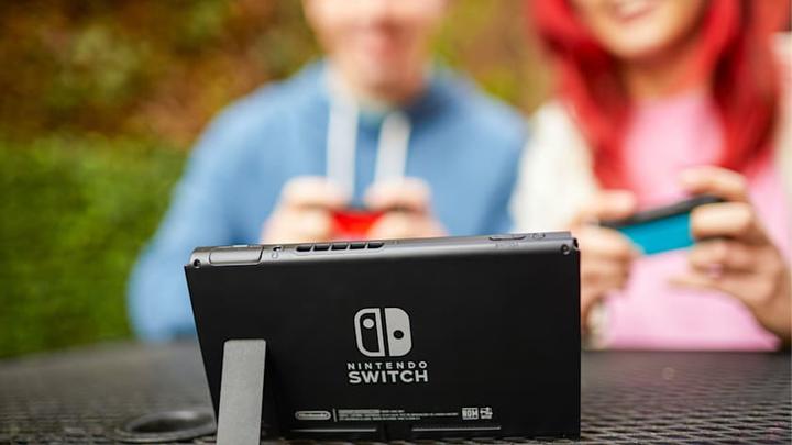 Actual product image Nintendo Switch Console - Neon Red/Neon Blue (UK) (Switch)