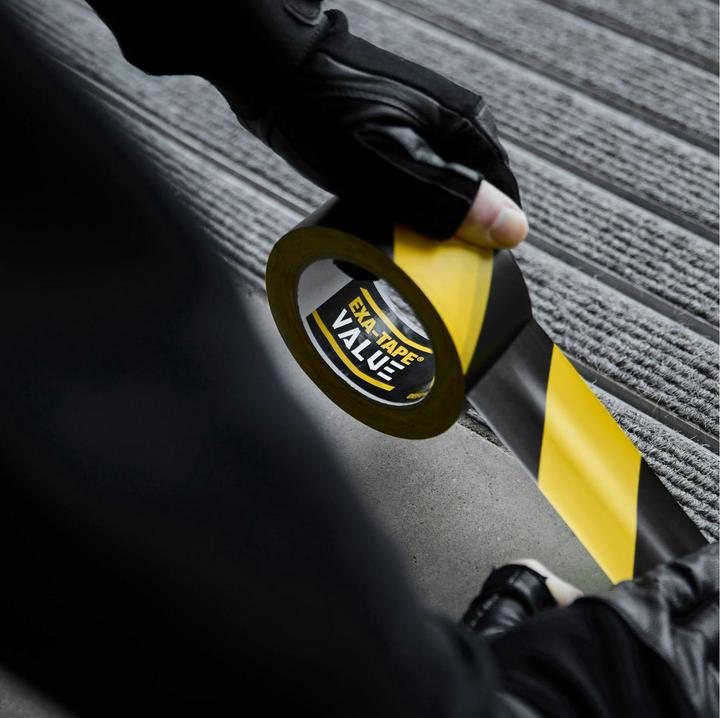 Produktbild Defender EXA-TAPE® VALUE BY 50 - PVC Warnband | schwarz/gelb | 50 mm x 33 m (50 mm)