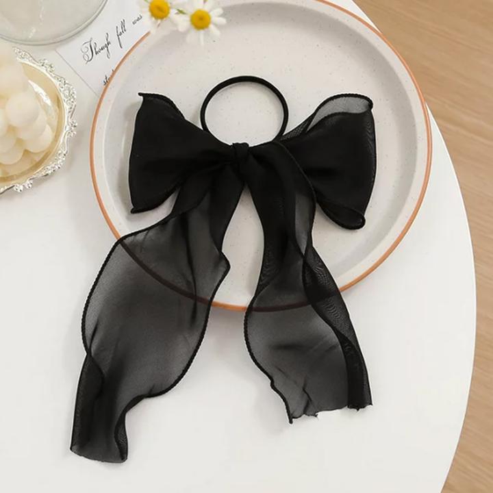 Immagine prodotto Avizar Transparenter Schleifen-Haargummi (Elastico per capelli)