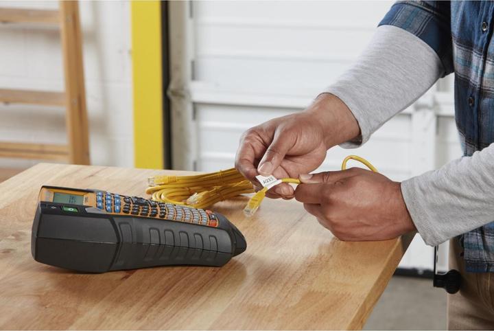 Actual product image Dymo Rhino 24mm black on yellow vinyl (2.40 cm, Yellow)