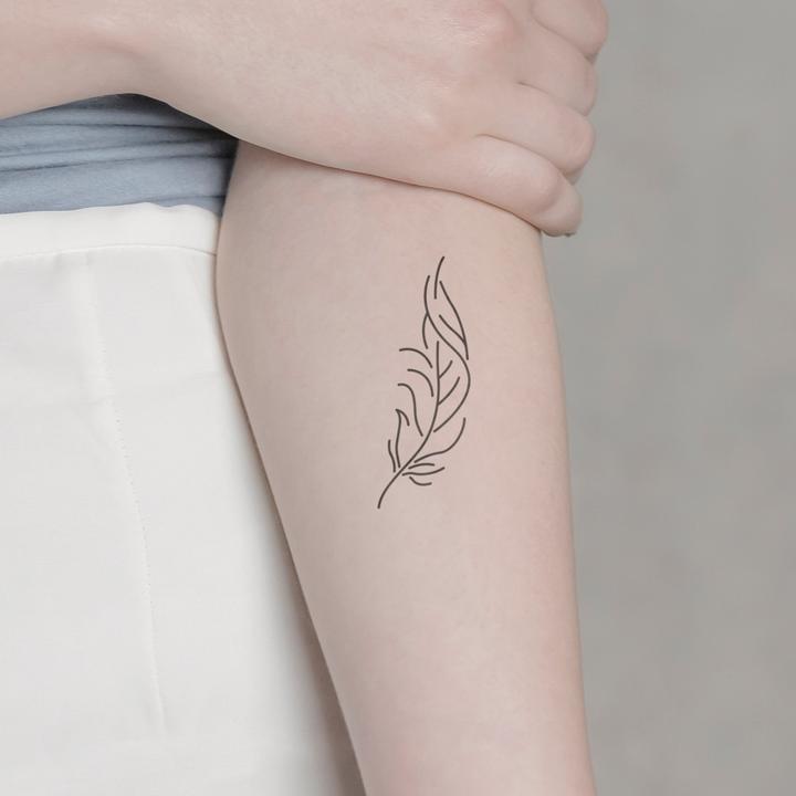 Actual product image minink Temporary tattoo - curved feather