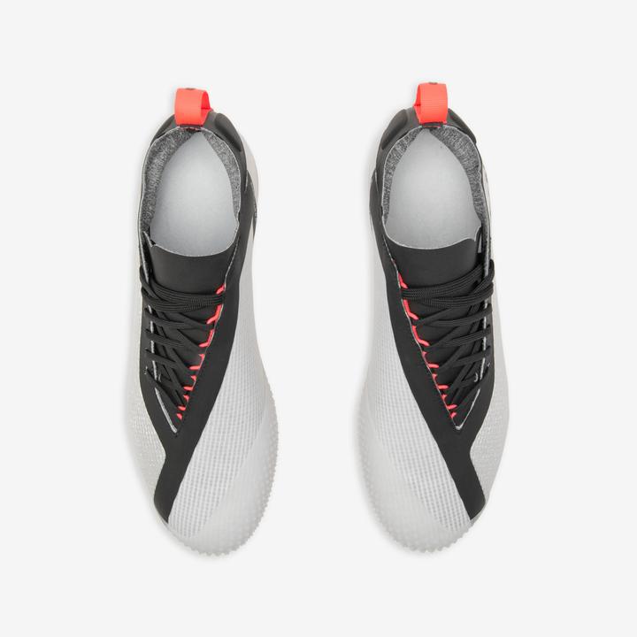 Immagine prodotto Kipsta Scarpe da calcio cam da donna/uomo AG/FG - Traxium Edge Alluminio arancione (41)
