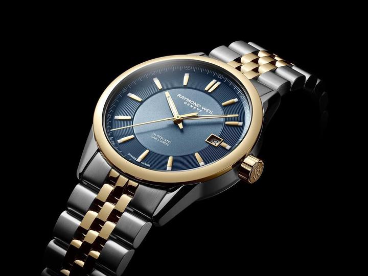 Immagine prodotto Raymond Weil Orologio automatico con quadrante blu, calendario e cinturino multicolore (38 mm)