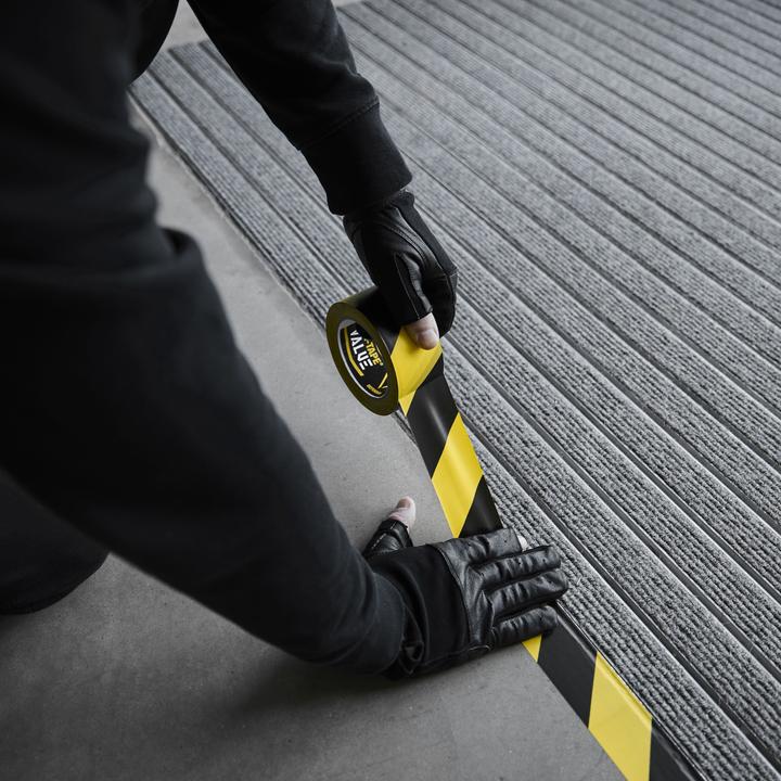 Produktbild Defender EXA-TAPE® VALUE BY 50 - PVC Warnband | schwarz/gelb | 50 mm x 33 m (50 mm)