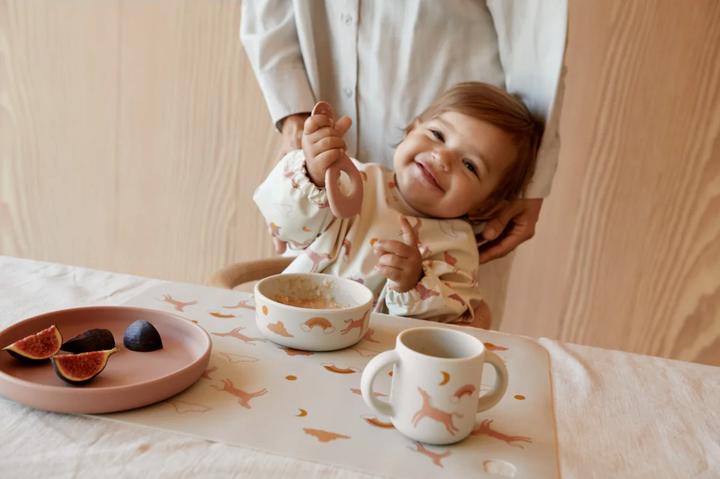 Actual product image Liewood Lätzchen Merle mit Aermel Dream Ecru