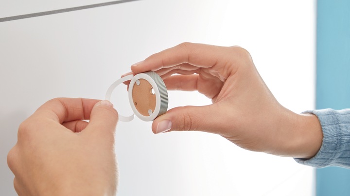 Actual product image tesa MOON hairdryer holder incl. adhesive solution without drilling