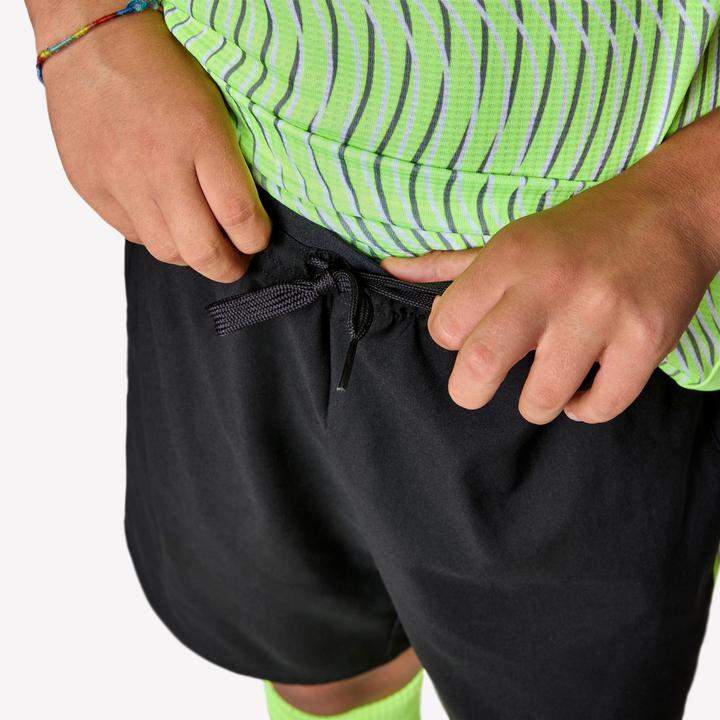 Image du produit Kipsta Short de football enfant viralto wavy noir bande jaune (140)