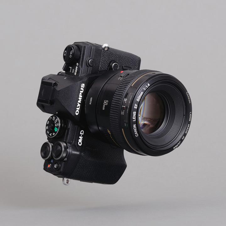 Actual product image Urth Electronic Lens Mount Adapter EOS M4/3
