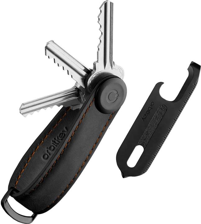 Cuciture arancioni, Nero