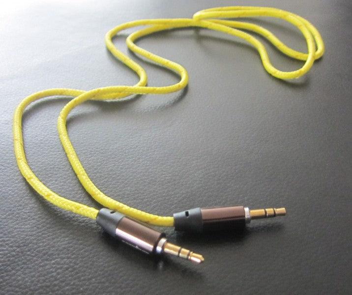 Immagine prodotto Hermex 1m 3.5mm Premium ORIGINAL UNHO Audio AUX Jack Stereo FLAT Cable YELLOW (1 m, Cavo AUX)