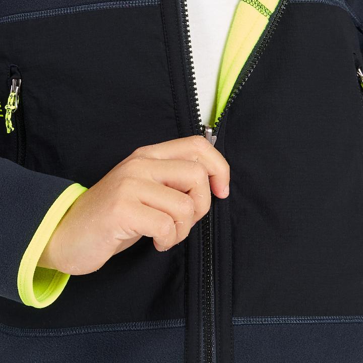 Produktbild Tribord Fleecejacke Segeln Kinder warm wendbar 500 marineblau/neongelb (164)