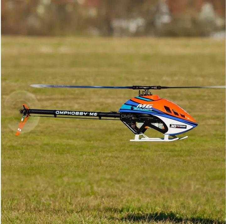Actual product image OMP Hobby Helikopter M6 Cosmic-Orange Bausatz und Rotorblätter
