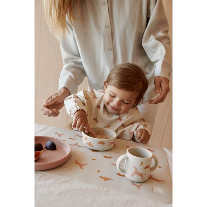 Actual product image Liewood Lätzchen Merle mit Aermel Dream Ecru