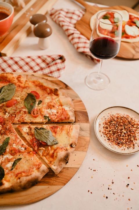 Produktbild TeakHaus Canoe Servierbrett Pizza mit Griff M