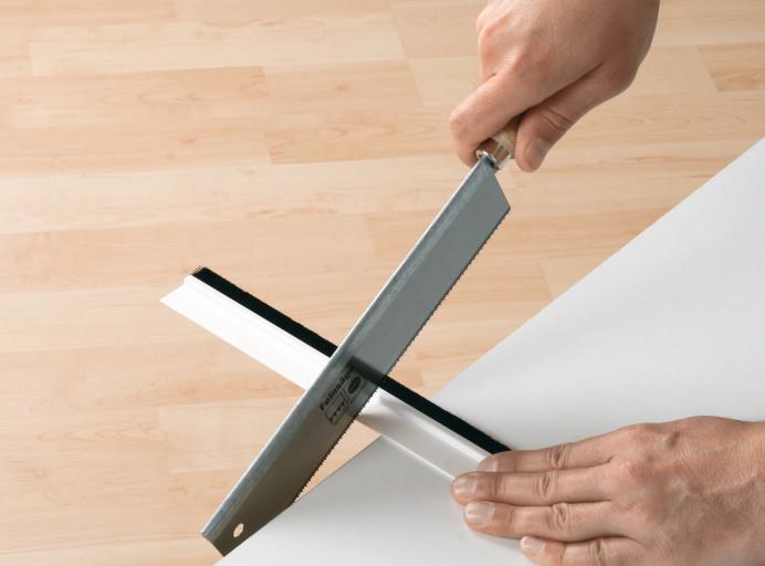 Produktbild tesa tesamoll STANDARD Türdichtschiene, selbstklebende Türdichtung für glatte Böden