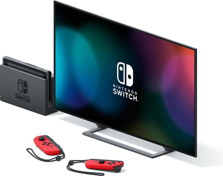 Image du produit Nintendo Switch Rouge + Code de téléchargement Super Mario Odyssey + Autocollant du film Super Mario Bros.
