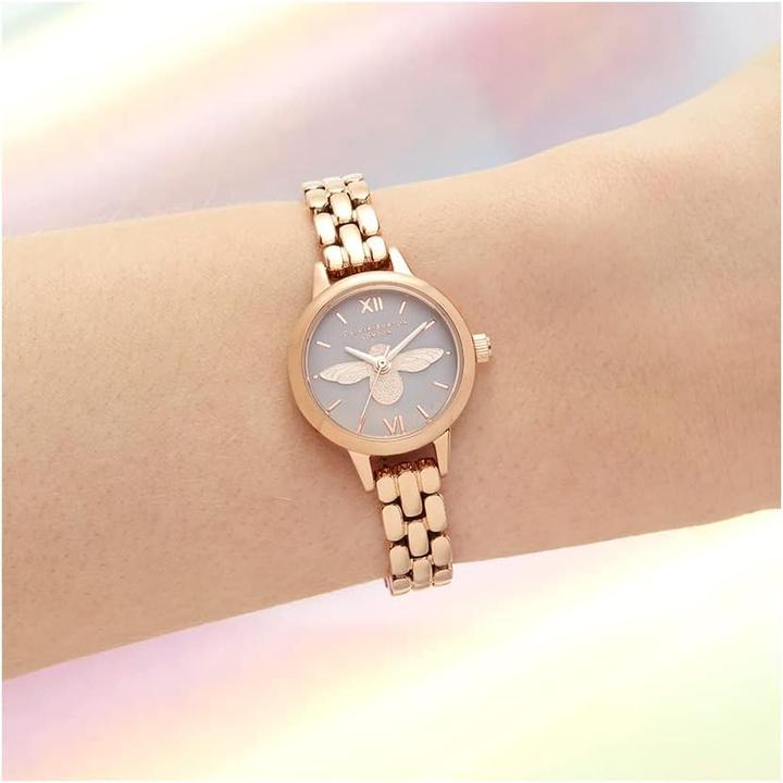 Actual product image Olivia Burton Analoog kwartshorloge met rosegoudkleurige roestvrijstalen armband voor dames OB16MC53 (Analogue wristwatch, 23 mm)