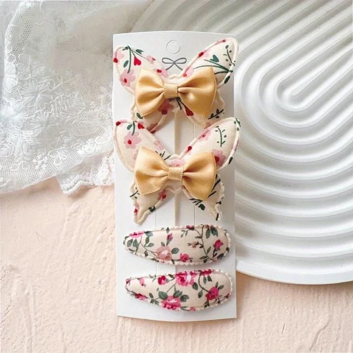 Actual product image Activity Board 4 Stück elegante Schleifen-Haarspangen - Polyester, geflochtene, florale und einfarbige Designs (4 pcs.)