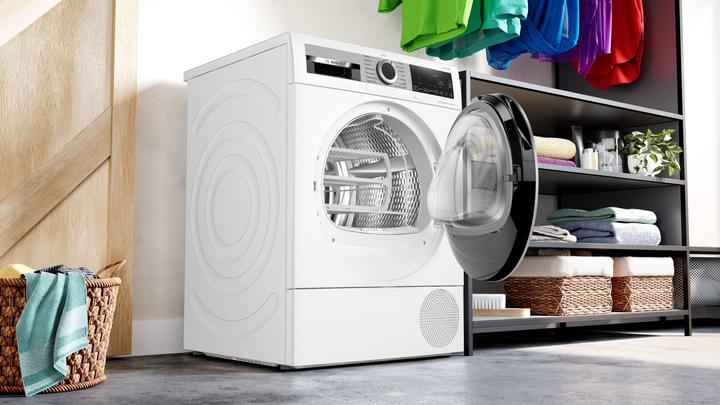 Produktbild Bosch Hausgeräte Serie 6 WQG245D0IT Wäschetrockner Kostenlose Installation Frontlader 9 kg A++ Weiss (9 kg, Rechts)