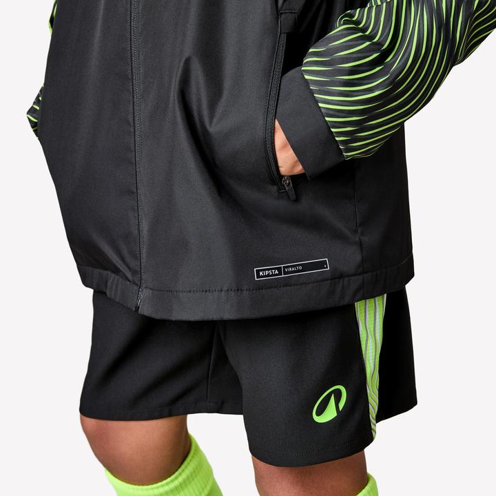Produktbild Kipsta Kinder Fussball Regenjacke - VIRALTO Wavy schwarz/neongelb (176)