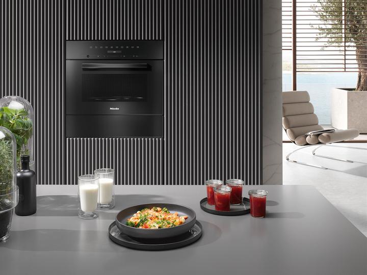 Actual product image Miele Built-in microwave oven in a perfectly combinable design with top-mounted controls. M 7244 T