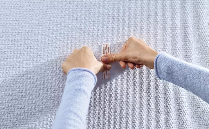 Actual product image tesa Adhesive nail for wallpaper & plaster, 1kg holding power, removable without a trace & reusable, 2