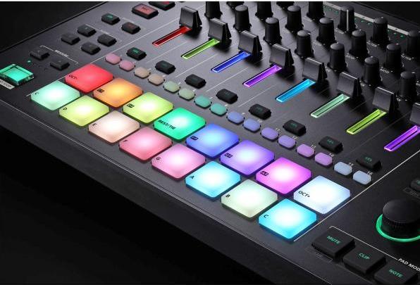 Actual product image Roland MC-707 Groovebox DJ mixer with headphones